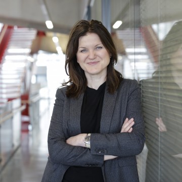 Women scientist Professor Petra Hajkova standing inside research institute