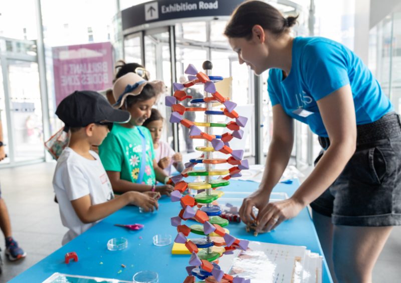 Figure 1: A group of visitors explore how DNA is folded whilst completing the epigenetics puzzle.